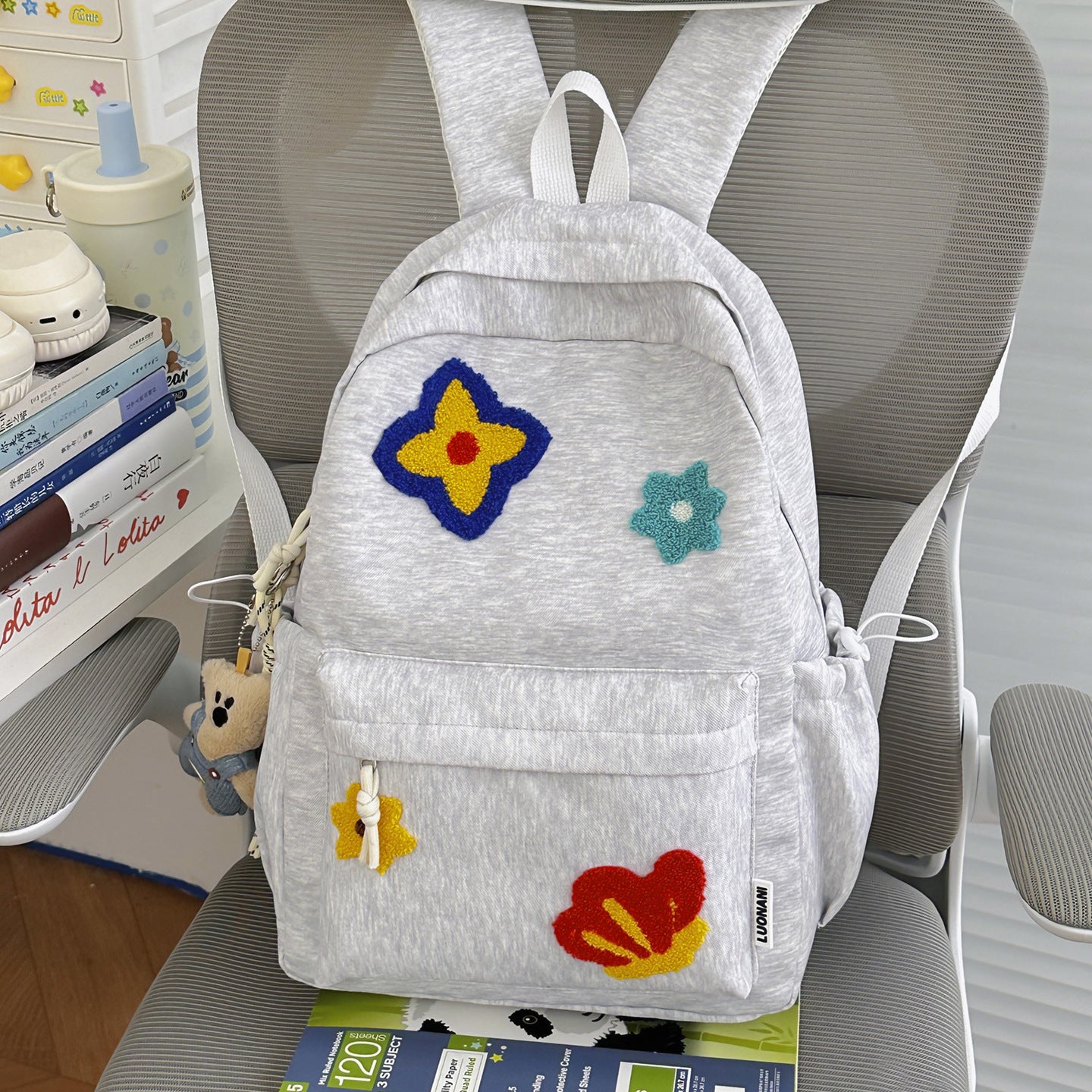 Blumenbestickter Schulrucksack