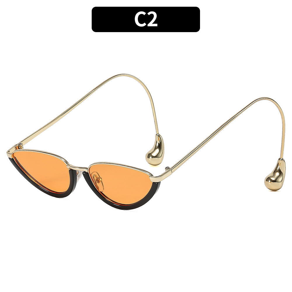 Skulpturale Retro-inspirierte Katzenaugen-Sonnenbrille