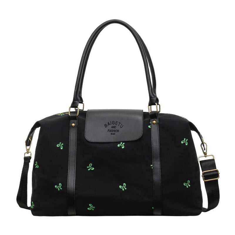 Stylische bestickte Reisetasche