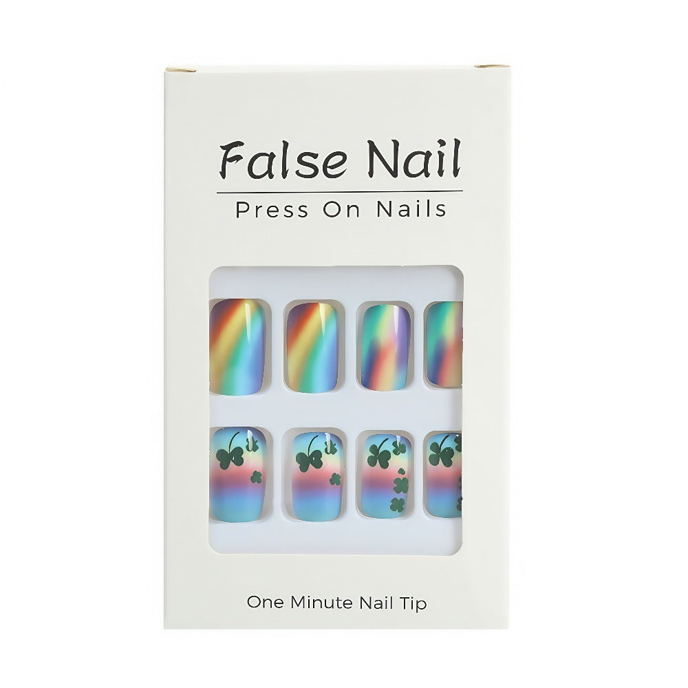 Kunstnägel mit bunten Regenbogen- und Kleeblatt-Designs Brehn
