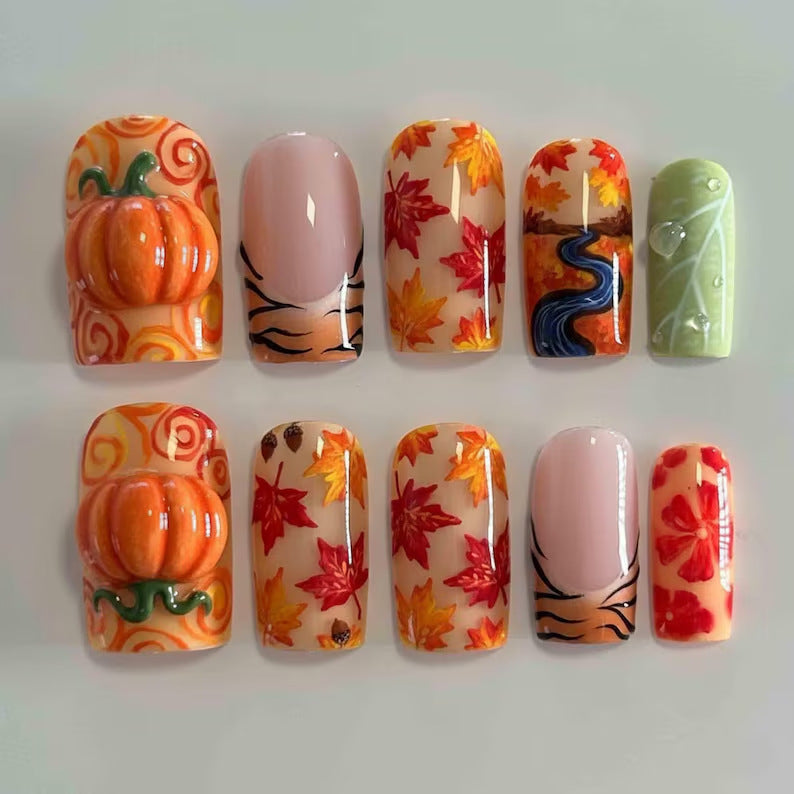 Kunstnagelset mit herbstlichen Motiven und kreativen 3D-Elementen Brehn