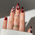 Kunstnagelset mit festlichem Winterdesign und glamourösen Akzenten Brehn
