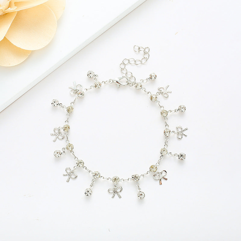 Crystal Bow Charm Bracelet Brehn