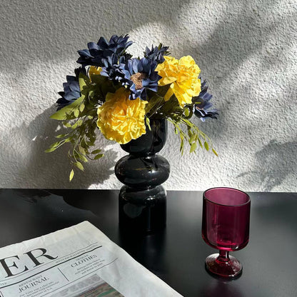 Lebensnahe dekorative Blumenmittelpunkt