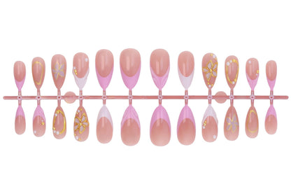 Kunstnagelset mit floralen und glitzernden Verzierungen Brehn
