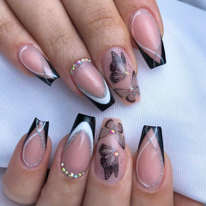 Künstlerische Lange Stiletto Press-On Nagelkunst mit Schmetterlingsdesign Brehn