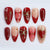 Dekorativer Press-On-Nagelset mit eleganten Herz- und Blumendesigns Brehn