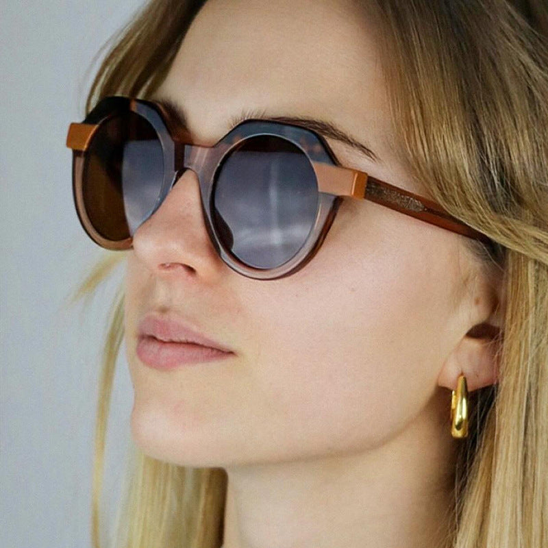 Damen extravagante runde Sonnenbrille mit farblich akzentuiertem Rahmen Brehn