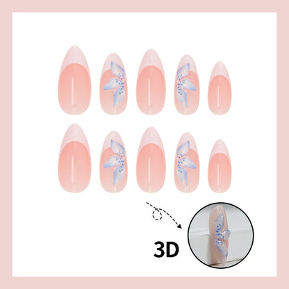 Kunstnagelset mit eleganten, blauen Blütenmotiven Brehn