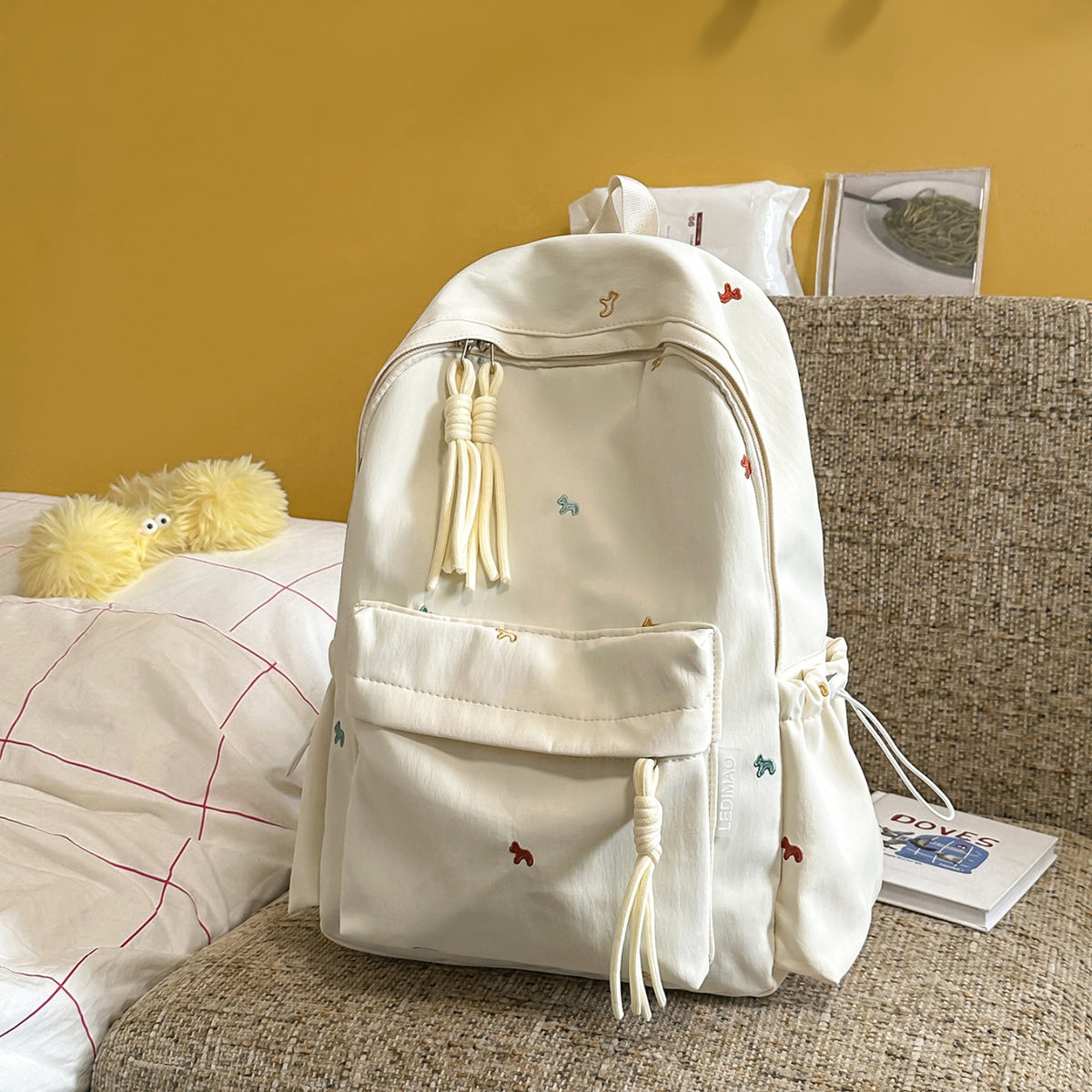 Stylischer backpack mit floralem Schmuck Brehn