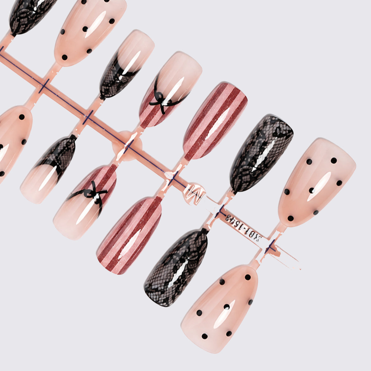 Kunstnagelset mit eleganten Schleifen- und Spitzenakzenten Brehn