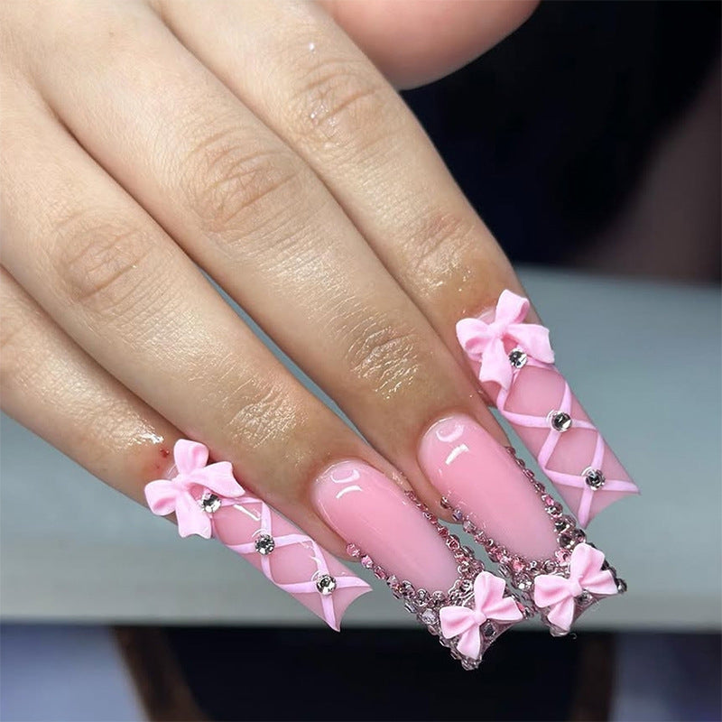 Dekorativer Press-On Fingernagelset mit elegantem Bogen und Juwel-Akzenten Brehn 1788496283