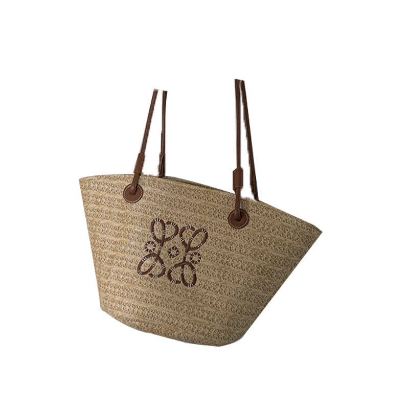 Damen Elegante Handtasche aus geflochtenem Naturmaterial mit luxuriösen Ledergriffen Brehn