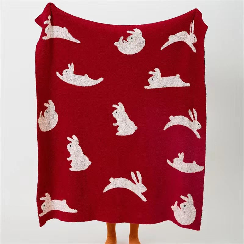 Kuscheldecke aus Jacquardstrick mit Hasenmotiven Brehn