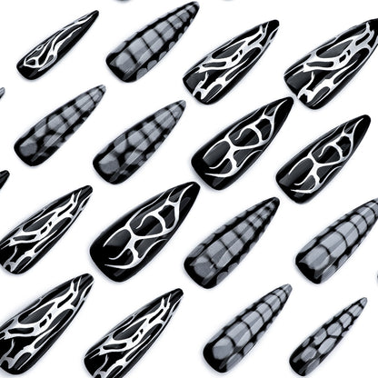 Kunstvolle Stiletto-Nägel mit modernem Strukturen-Design Brehn