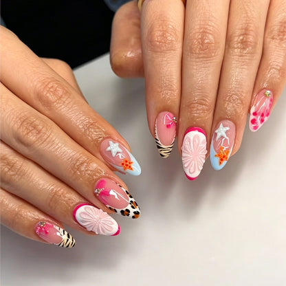 Kunstnagelset mit kreativen floralen und maritimen Designs Brehn