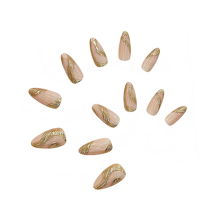 Künstlerisches Press-On Nagelset mit goldener Wirbel-Design Brehn