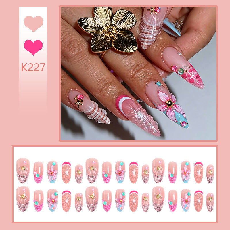 Kunstnagelset mit bunten blühenden 3D-Applikationen Brehn