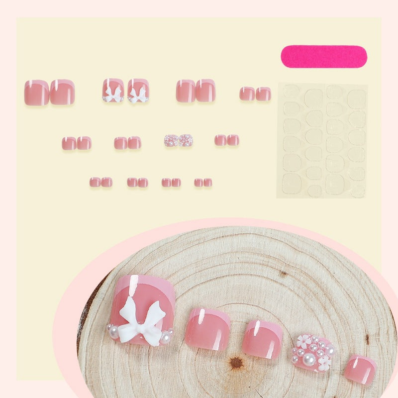 Kunstnagelset mit romantischen Schleifen-Design Brehn
