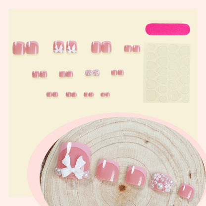 Kunstnagelset mit romantischen Schleifen-Design Brehn