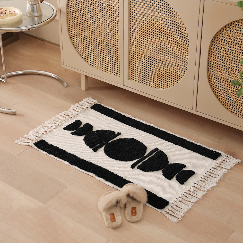 Gewebter Vorleger im Boho-Minimalstil mit kontrastiertem Tufting und Baumwollfransen Brehn