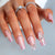 Kunstnagelset mit funkelnden Glitzerakzenten und eleganten Schmetterlingsmotiven Brehn