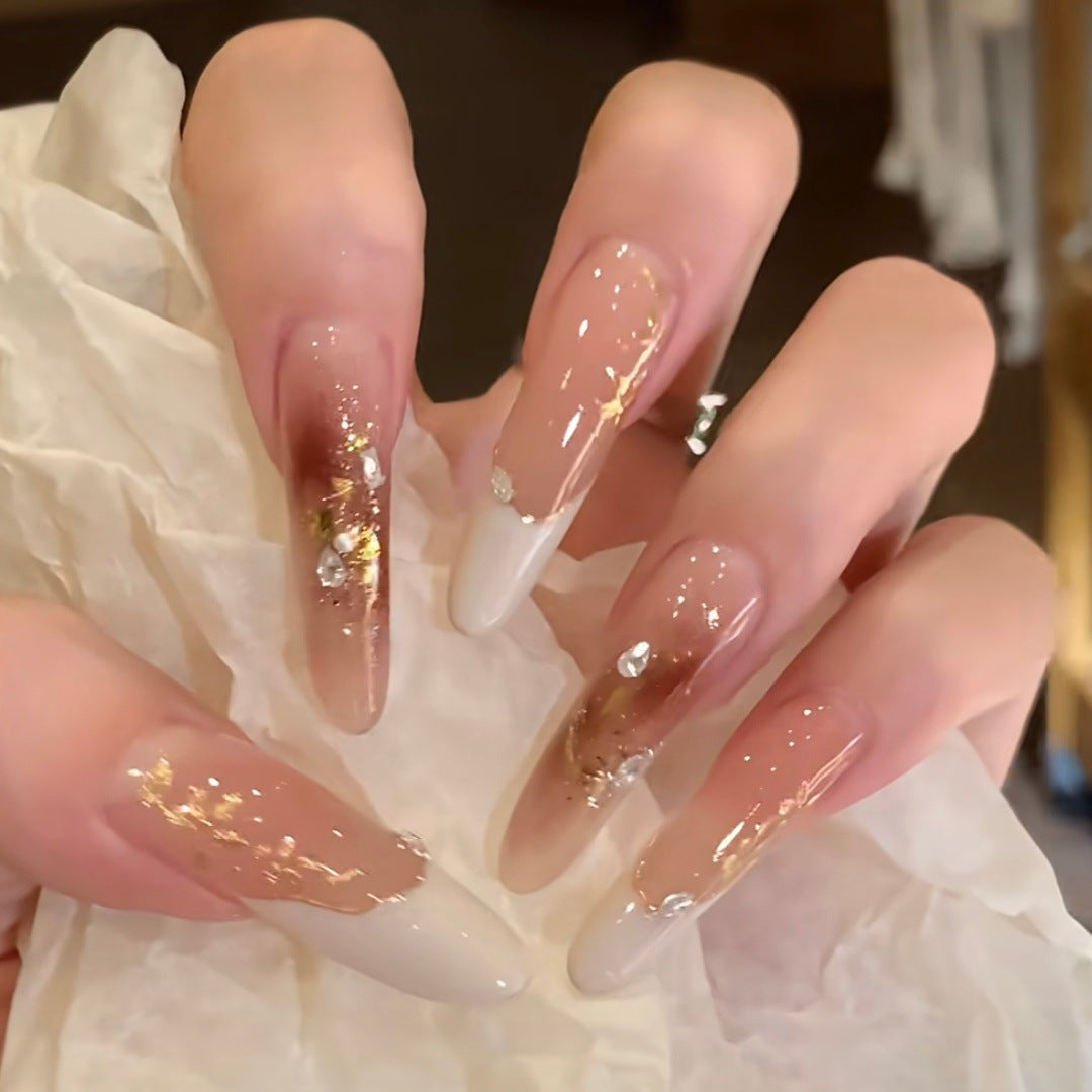Elegantes Stiletto Press-On Nagelset mit floralem und glitzerndem Design Brehn