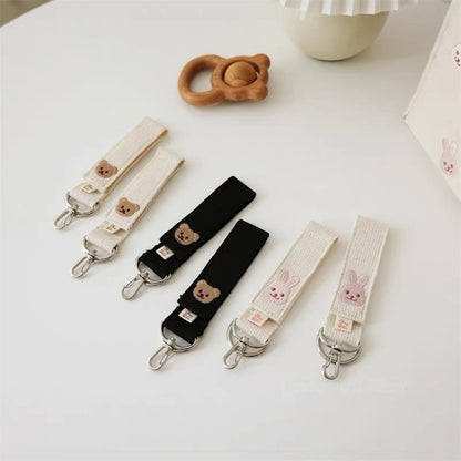 Gewebtes Schlüsselband mit gesticktem Bärenmotiv und drehbaren Metallclips
