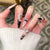 Kunstnagelset mit glamourösen 3D-Applikationen und festlichem Design Brehn