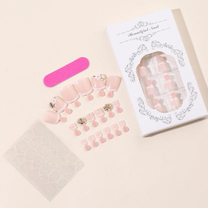Kunstnagelset mit eleganten Glitzer- und Blumendetails Brehn