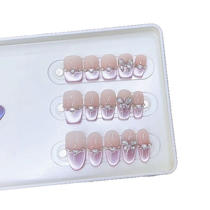 Elegantes Press-On-Nagelset mit Schmetterlingsakzenten Brehn