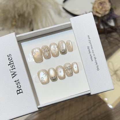 Elegantes mit Schleifen verziertes Press-On Nail Art Set Brehn