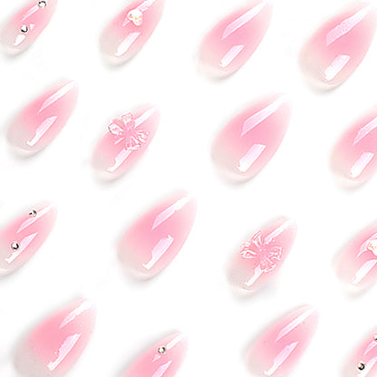 Kunstvolle Stiletto-Nägel mit floralem Design und Glitzer Brehn