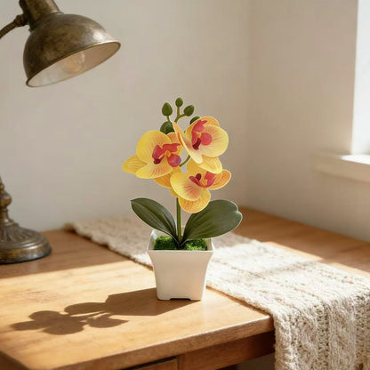 Realistische Künstliche Orchidee in dekorativem Pflanzenpot für Dekoration