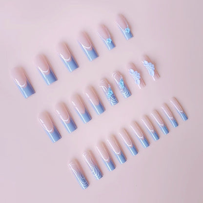 Kunstnagelset mit zarten floralen Akzenten und eleganten Verzierungen Brehn