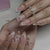 Kunstnagelset mit floralen und eleganten Details Brehn