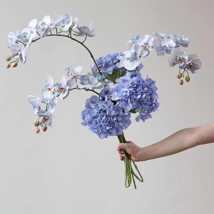 Lebensechte künstliche Orchideenarrangement
