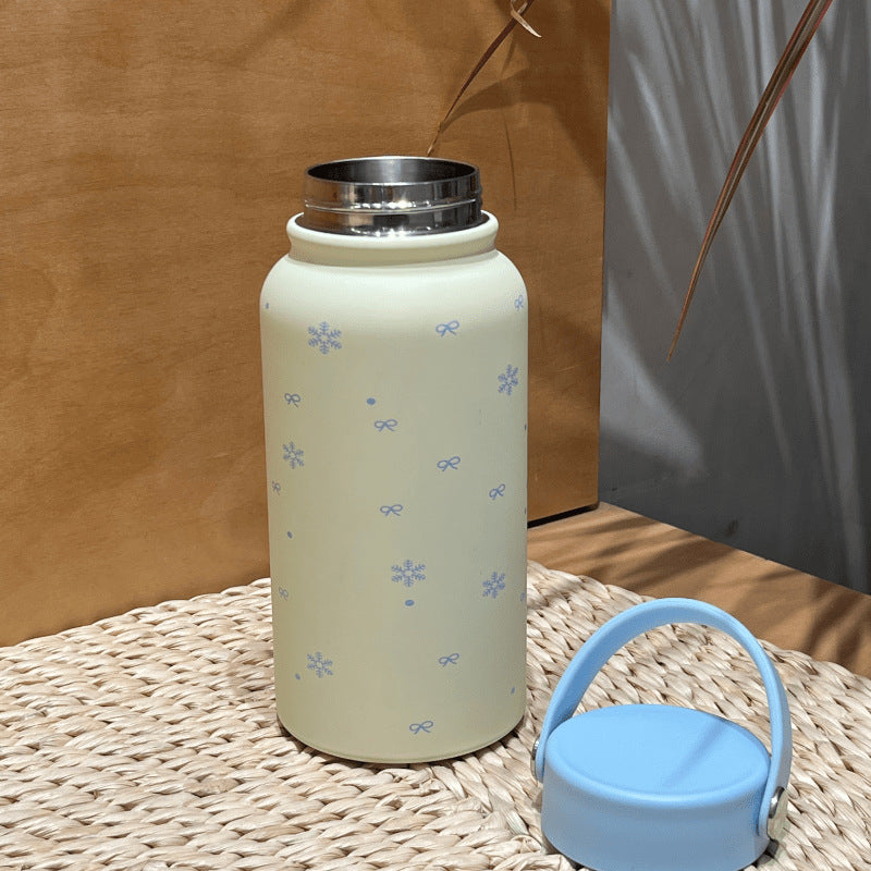 Damen Isoliertrinkflasche mit praktischem Tragegriff und fröhlichem Design Brehn
