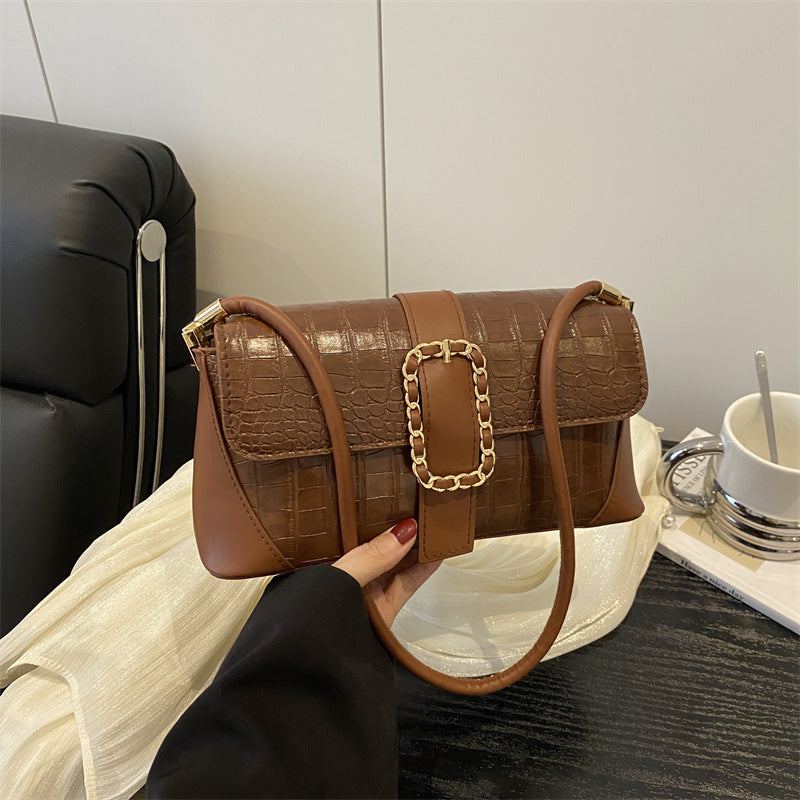 Krokodilmusterte Kettenriemen-Handtasche Brehn