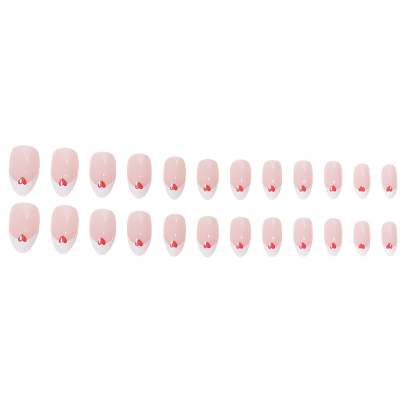 Herzgeschmücktes French Tip Nagelset Brehn