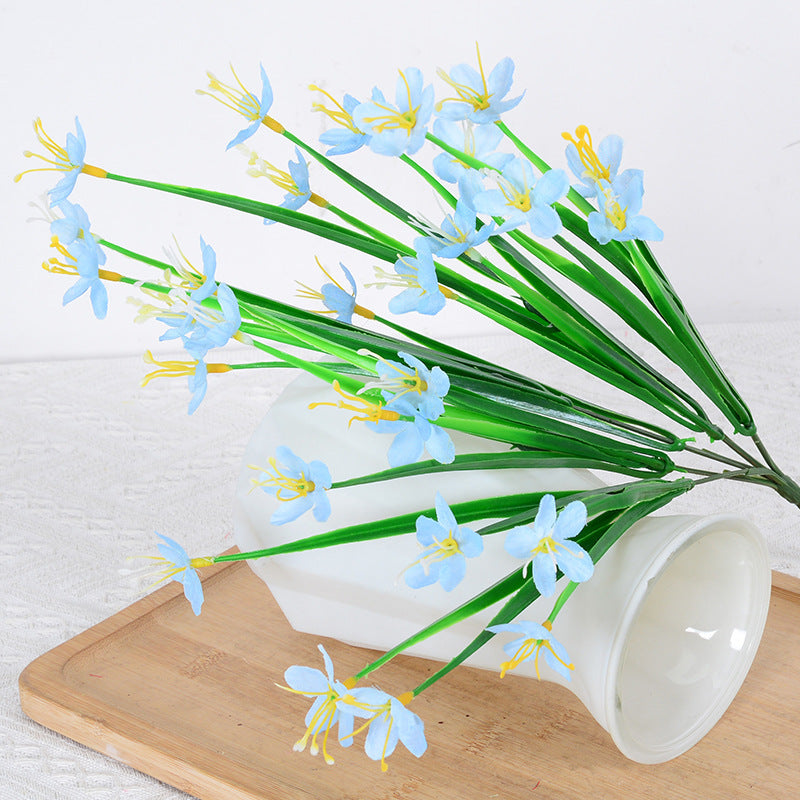 Künstliches Orchideenstammarrangement