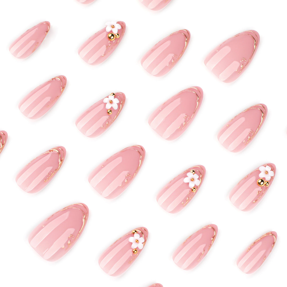 Kunstvolle Nagelgestaltung mit goldenen Akzenten und floralen Details Brehn