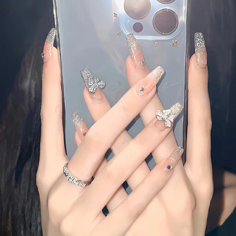 Kunstnagelset mit funkelnden Glitzer- und holografischen Akzenten Brehn
