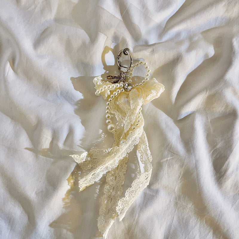 Eleganter mit Perlen verzierter Charm-Schlüsselanhänger Brehn