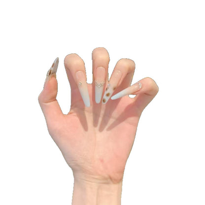 Dekorative Stiletto Press-On Nagelverzierungen