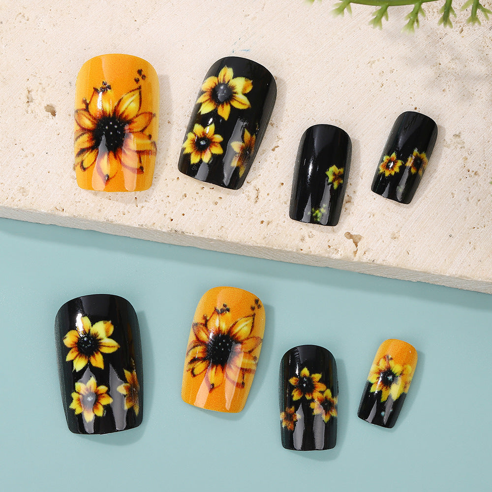 Kunstnägel im floralen Design mit Sonnenblumenmotiv Brehn