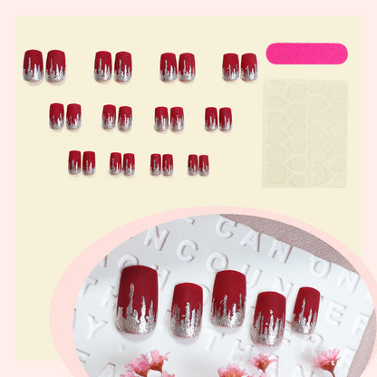 Künstlerisches Press-On Nail Set mit Silber Tropfen Design Brehn