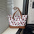 Verspielt bedruckte Canvas-Tasche Brehn