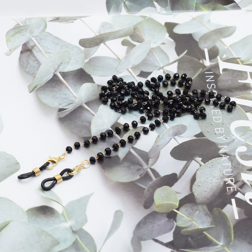 Eleganter mit Blumenakzenten verzierter Brillenketten Brehn