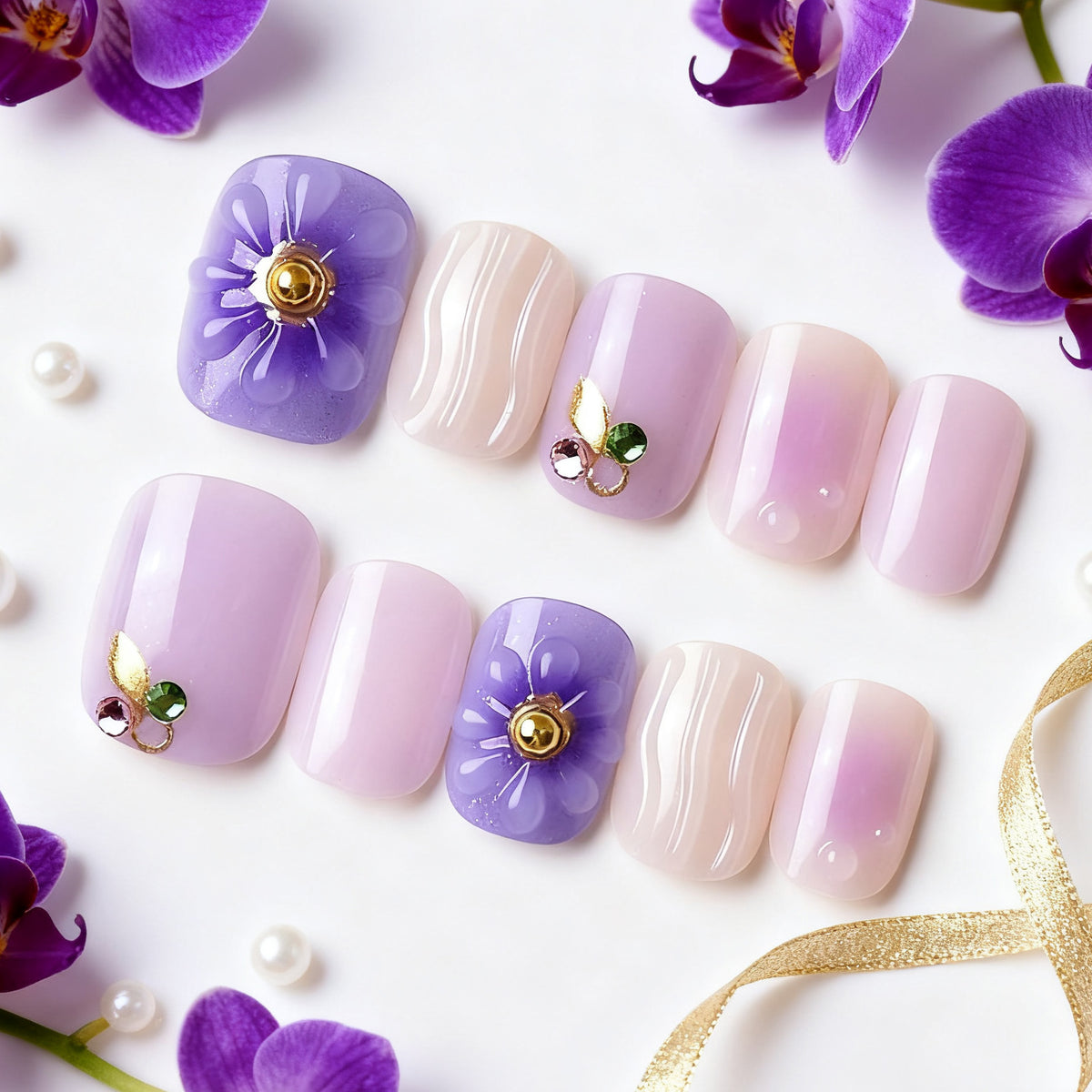 Elegantes dekoratives Press-On-Nagelset mit floralen und Juwelenakzenten Brehn